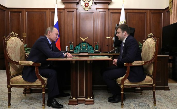 President Putin smiling at Maxim Oreshkin. Photo courtesy of the Kremlin